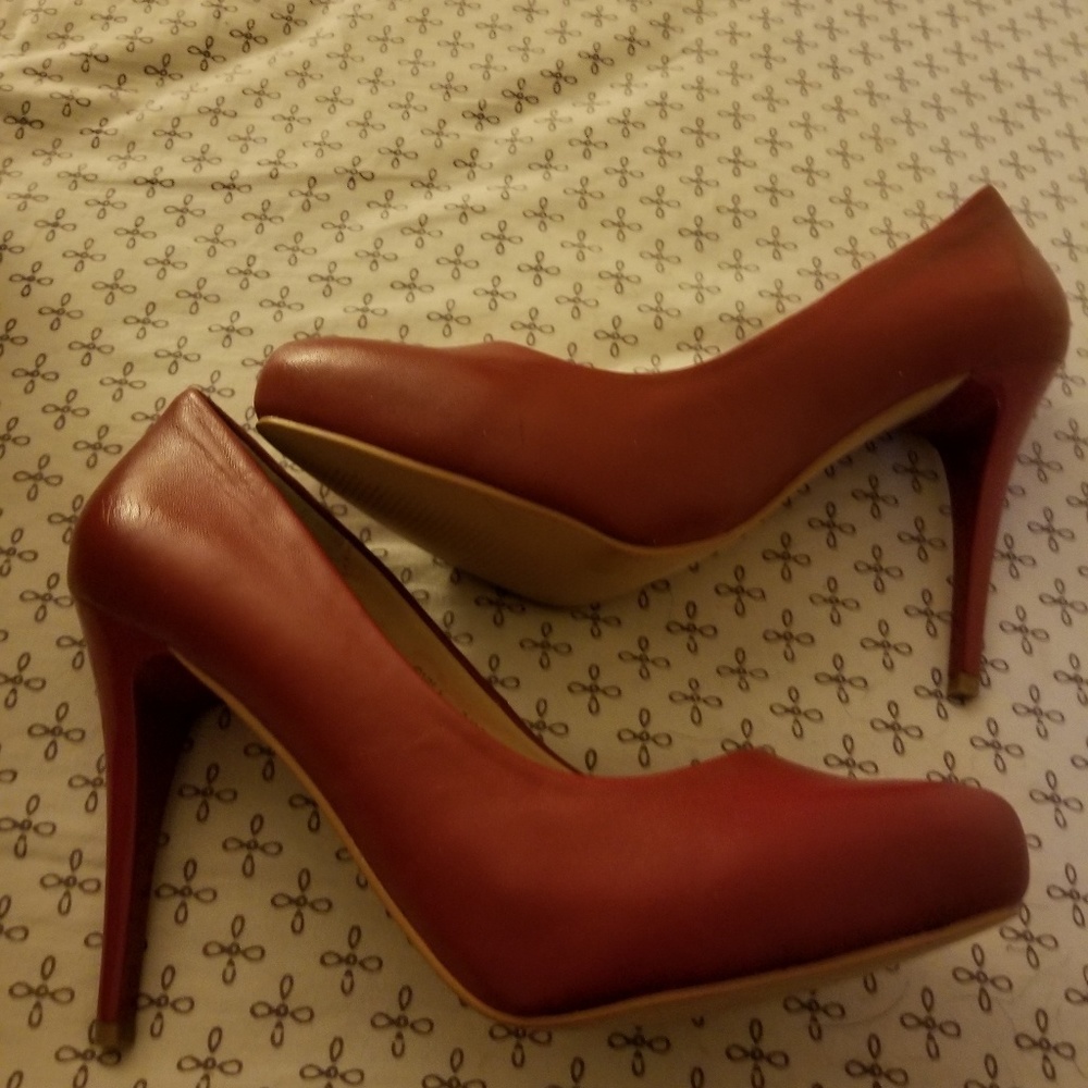 Red Heels by RSVP. Never been worn.